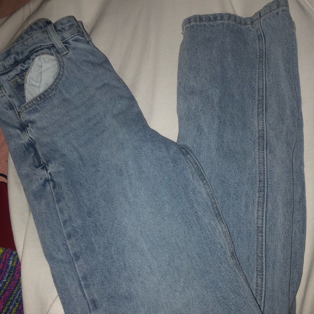 Straight leg, light blue wash, split hem, high rise jeans from FashionNova